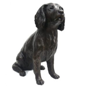 Bronze springer spaniel sculpture Tilly sitting alert with expressive face and long flowing ears